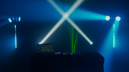 DJ Setup with Vibrant Light Show in Club Atmosphere