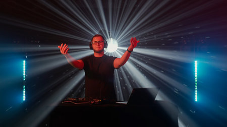 Professional DJ Mixing Music at Nightclub Event