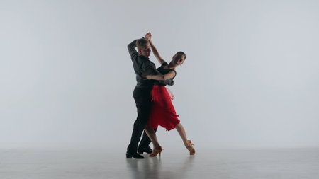 Silhouette Elegant Ballroom Dance Couple on a white backgroundの写真素材