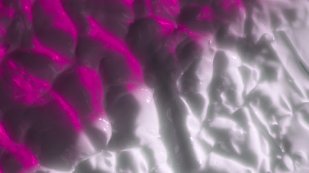 Uneven texture of cream in pink white color. Face or body cosmetic product, close up. Creative concept of beauty industry advertisement.の写真素材