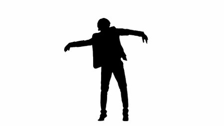 Modern businessman advertising concept. Man in studio isolated on white background with alpha channel. A black silhouette of a businessman in a suit dances funny.の写真素材