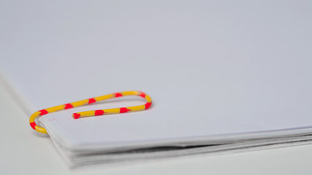 Time lapse of paper sheets on white background. Close up shot stop motion animation of business...