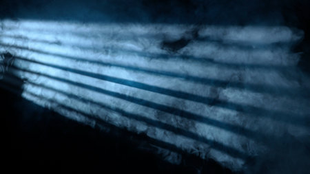 Studio shot of projector haze jalousie effect isolated on black background. Blue light rays shining...