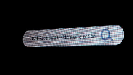 Shot of monitor screen. Pixel screen with animated search bar, keywords 2024 russian presidential election, browser bar with magnifying glass headline.の写真素材