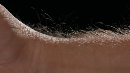 Macro shot of Hair Standing on End Against a Dark Backgroundの写真素材