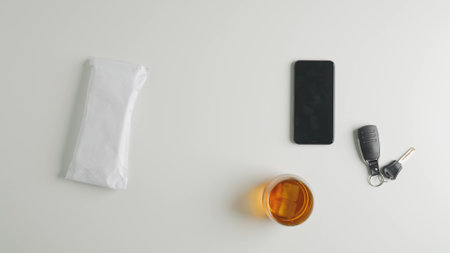 Minimalist Layout of Everyday Items on White Backgroundの写真素材