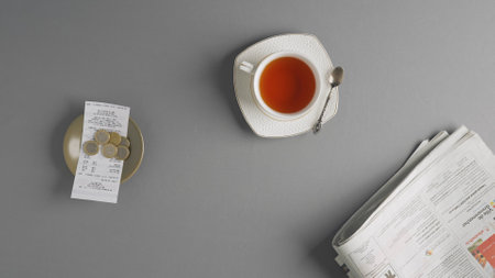 Top view of a paid bill in a cafe.の写真素材
