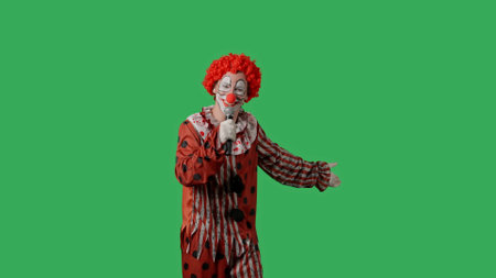 Funny clown on green screen chroma key.の写真素材