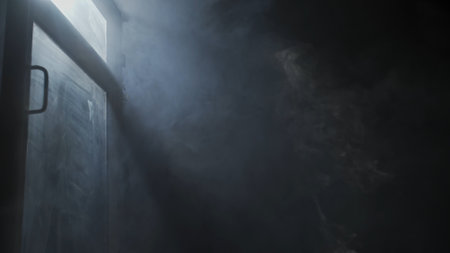 Soft diffused rays of light illuminate the foggy darkness and the window.の写真素材