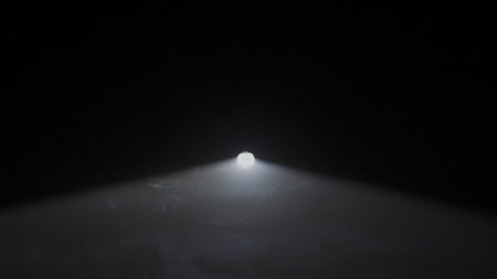 Bright white spotlights rays of professional lighting equipment flashing in darkness on black...