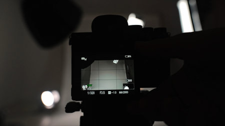 Professional studio for photo video filming with lighting and large cyclorama background, pov from...