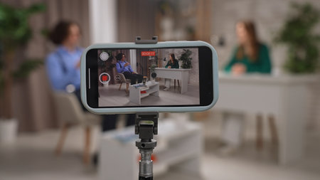 Engaging Discussion Takes Place in a Modern Podcast Studio With Influencers Sharing Insights