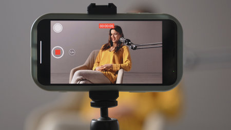 Engaging Conversation in a Podcast Studio With a Woman Sharing Her Insights