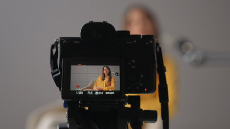 Engaging Conversation in a Podcast Studio With a Woman Sharing Her Insights