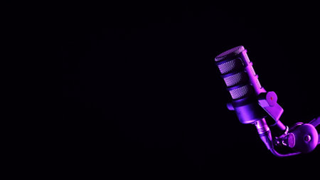 Studio microphone with dramatic purple lightingの写真素材