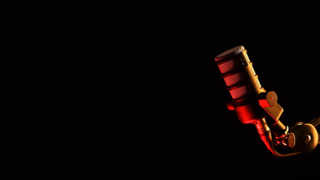 Studio microphone with dramatic red lightingの写真素材