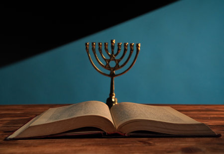 Open Book and Menorah Symbolize Heritage and Knowledgeの写真素材