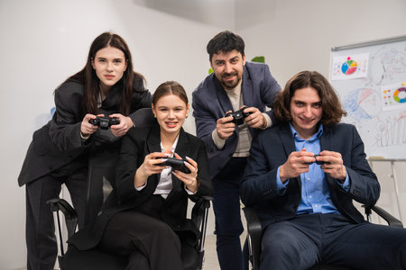 Group of Professionals Enjoying a Fun Gaming Session Together