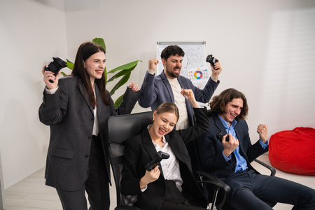 Group of Colleagues Celebrating Together in Office Environmentの写真素材