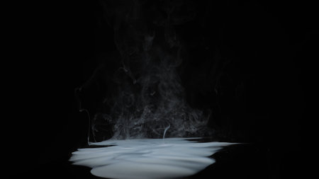 Mystical Smoke Rising from a Liquid Surfaceの写真素材