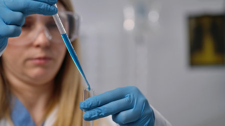 Scientist in Laboratory Carefully Handling Chemical Experiment