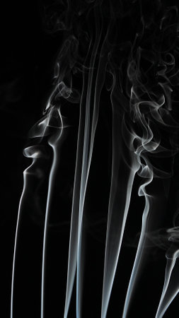 Abstract Smoke Patterns Against a Dark Backgroundの写真素材