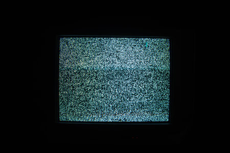 Retro Television Screen Displaying White Noise Static Effectの写真素材