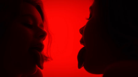 Reflection of a Face in a Mirror on a Red Backgroundの写真素材