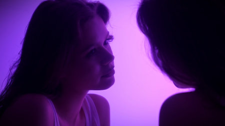 Reflection of a Face in a Mirror on a Purple Backgroundの写真素材