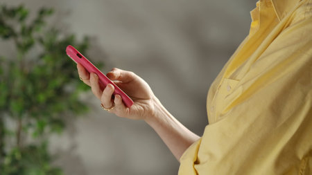 View of a Person Holding a Smartphone Device