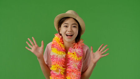 Cheerful Young Girl Celebrating with Joyful Expressionの写真素材