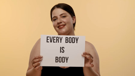 Empowering Message on the Poster Every Body is Body Positivity and Self Acceptanceの写真素材