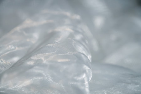 Detailed of Mesh Fabric with Water Droplets