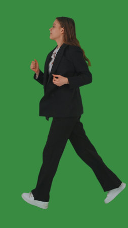 Professional Woman in Motion on Green Screen