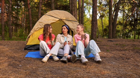 Friends Enjoying Outdoor Camping Experience in Nature Togetherの写真素材