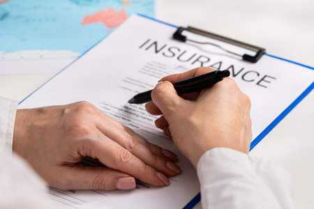 Signing an Important Insurance Document with Closeup Details