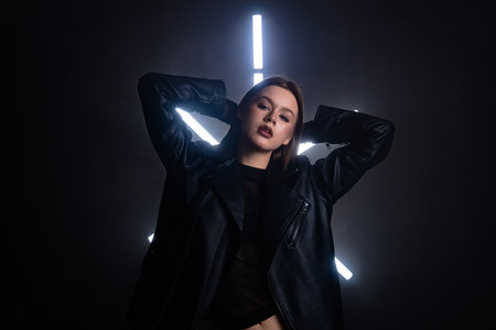 Fashion Portrait in Black Leather Jacket with Neon Lights