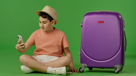 Traveler Taking Selfie With Purple Suitcaseの写真素材