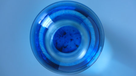 Blue Liquid in Glass Bottle Viewed from Aboveの写真素材