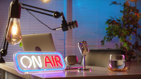 Modern Podcast Studio Setup with Neon On Air Signの写真素材