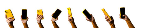 Yellow Smartphone Held by Hands Against White Backgroundの写真素材
