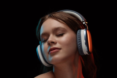 Portrait of Woman Enjoying Music with Headphones On