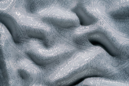 Elegant Patterned Fabric with Subtle Textured Details Displayの写真素材