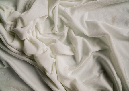 Soft White Fabric with Texture and Foldsの写真素材