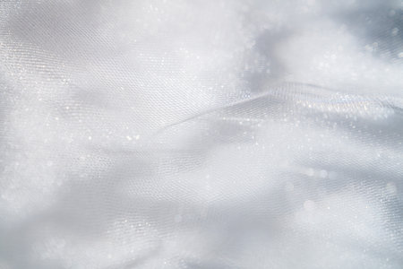 White Textured Fabrics with Subtle Light Sparklesの写真素材