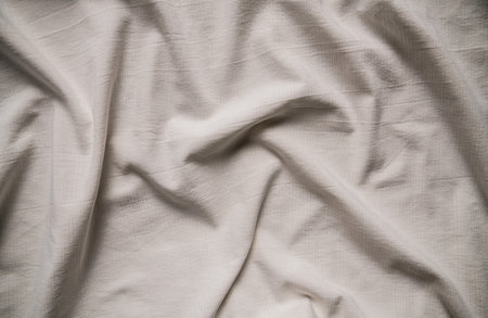 Soft White Fabric with Texture and Foldsの写真素材