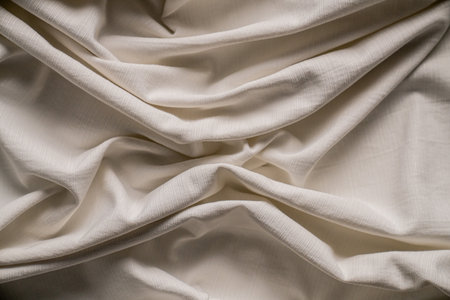 Soft White Fabric with Texture and Foldsの写真素材