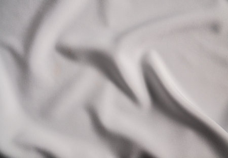 Soft White Fabric with Subtle Wrinklesの写真素材