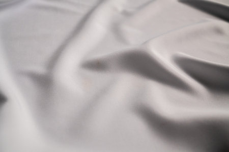 Soft White Fabric with Subtle Wrinklesの写真素材