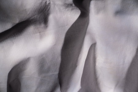 Abstract Light and Shadow Patterns on Fabric Surfaceの写真素材